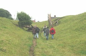 Lindum Heritage clients wallk up the main street or hollow way of North Elkington DMV 